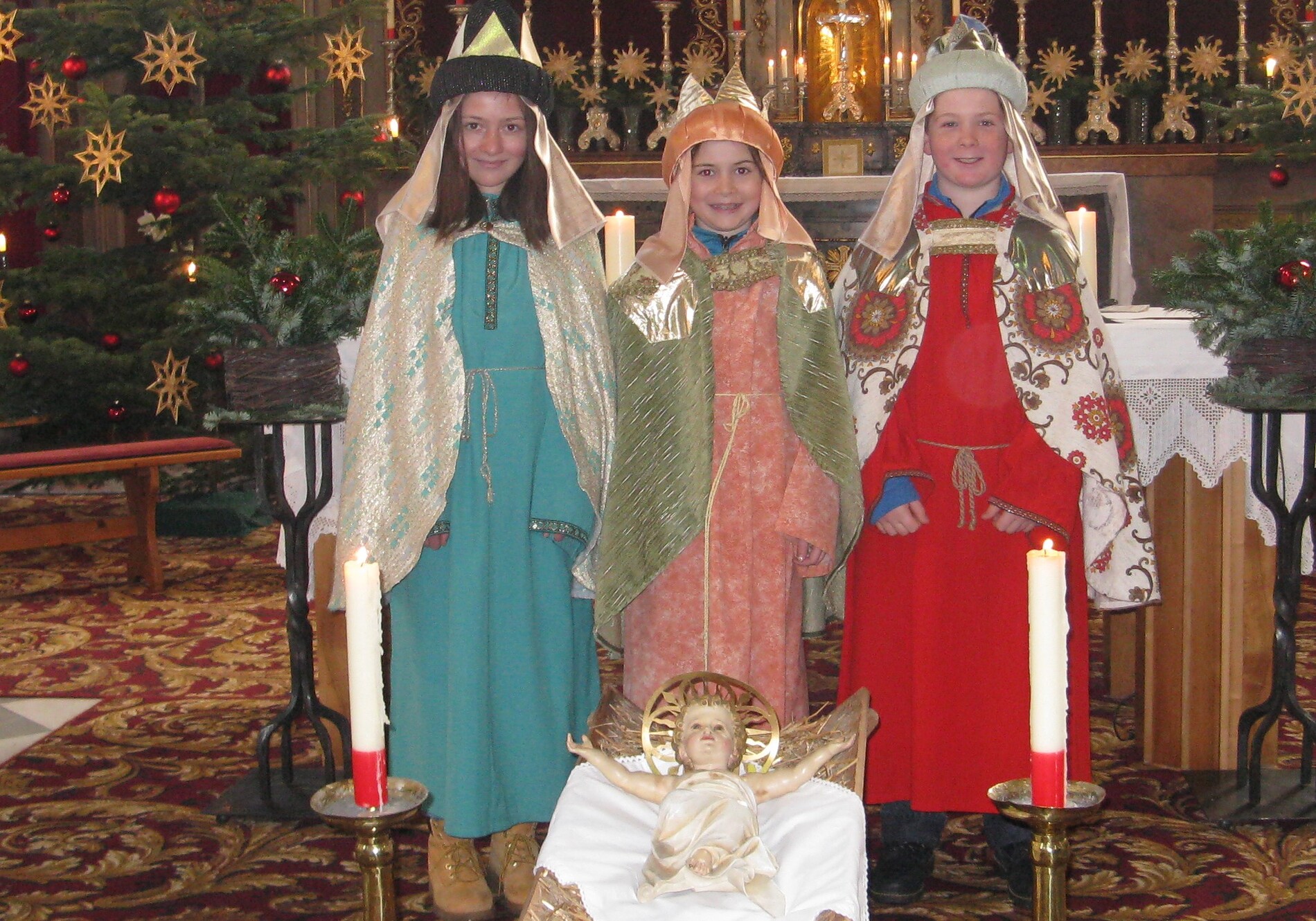 Marina, Katharina und Martin Bosetti in der Brixner Pfarrkirche 2017.